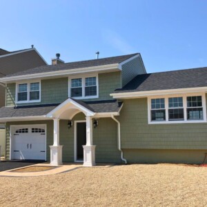 Vinyl Shake Siding in the color Sage with White trim