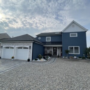 Vinyl Shake in the color Regatta Blue with White trim and Black gutters