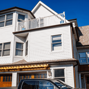 White Clapboard Siding with Brown Shingle Roof