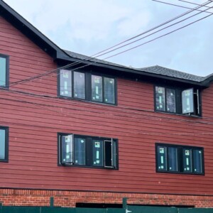 James Hardie Siding in the color Country Lane Red with Black trim