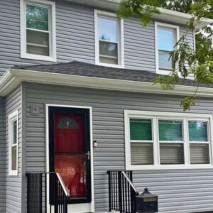 Vinyl dutchlap Siding in the color Nantucket with White Trim